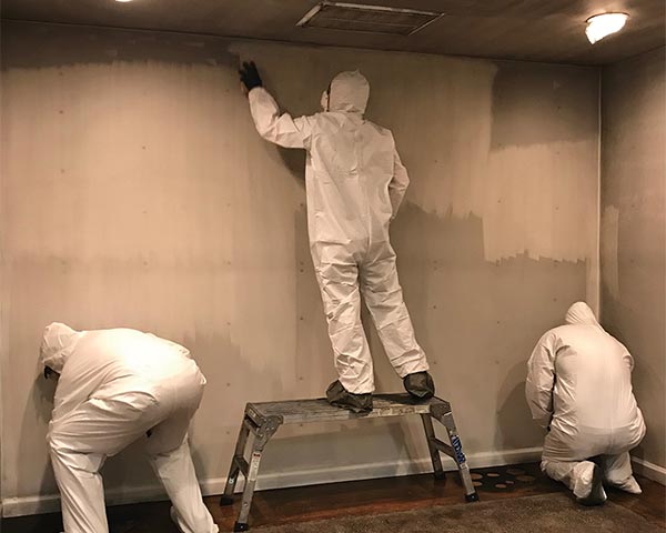 cleaning smoke damaged walls after a fire